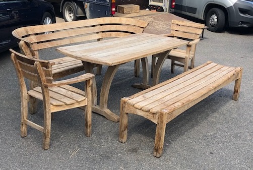 Gaze Burvill. An oak garden table, bench, low bench and pair of chairs Table L.170cm, Bench L.210cm, Low bench L.195cm